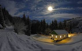 Cabin in the woods during the winter.
