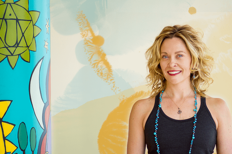 Betsy Brandl Rippentrop, Ph.D. (Dr. Yoga Momma) owner of Heartland Yoga in Iowa City, IA.